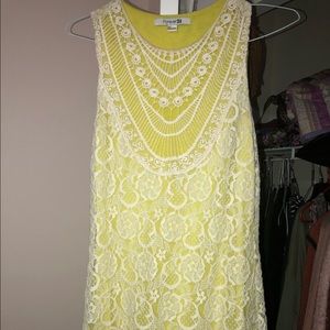 Yellow sleeveless lace dress